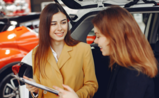 Two woman reviewing data on an ipad